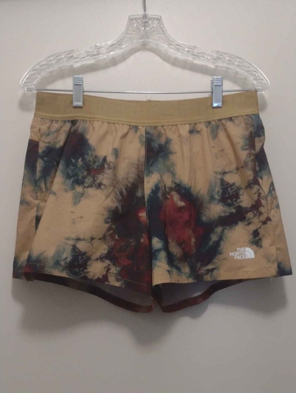 The North Face Women's Gold Athletic Shorts with Blue and Red Accents (J1392)